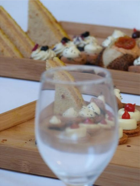 A glass and appetizers A glass and appetizers