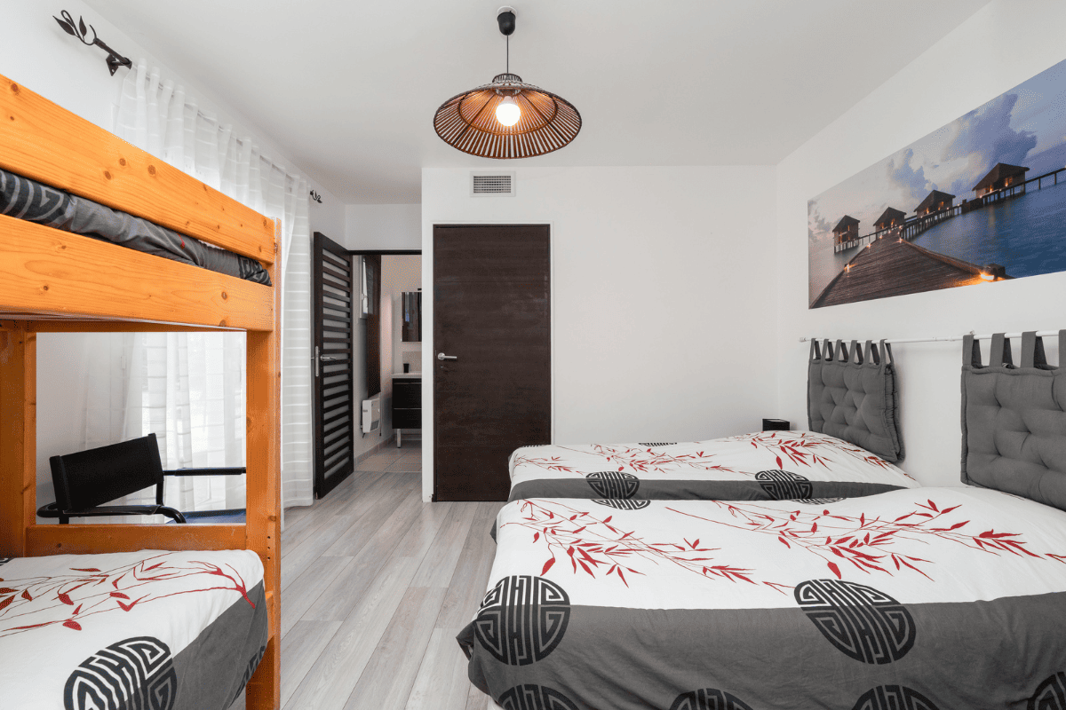 bedroom with four beds