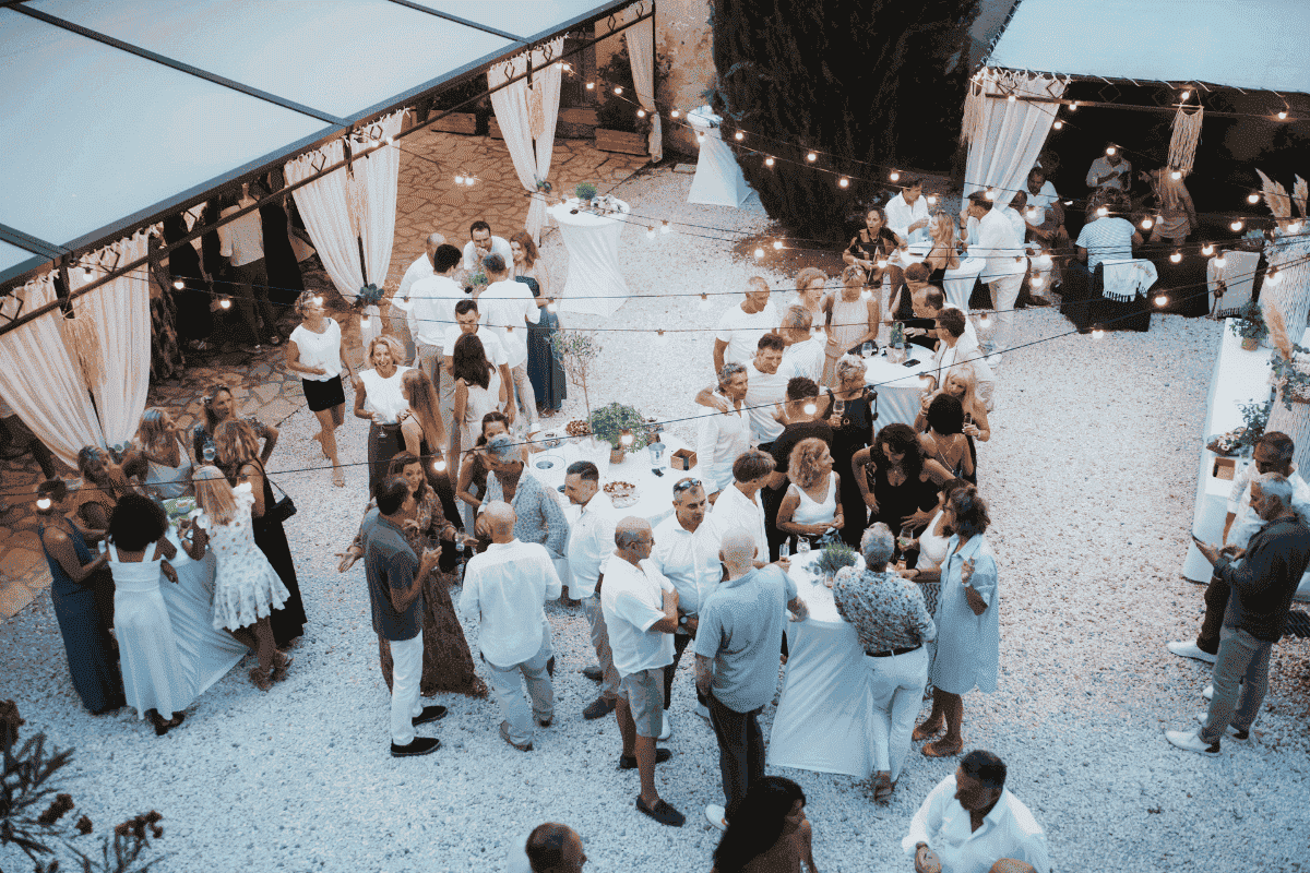 People gathering after the ceremony at La Cour d'Honneur - Event venue South France
