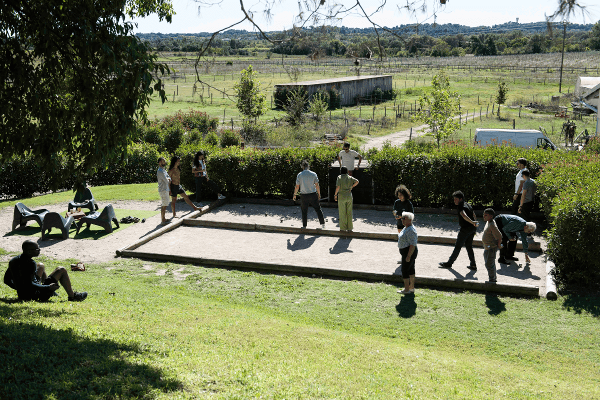 people playing pétanque at the estate - Activities South France Wedding